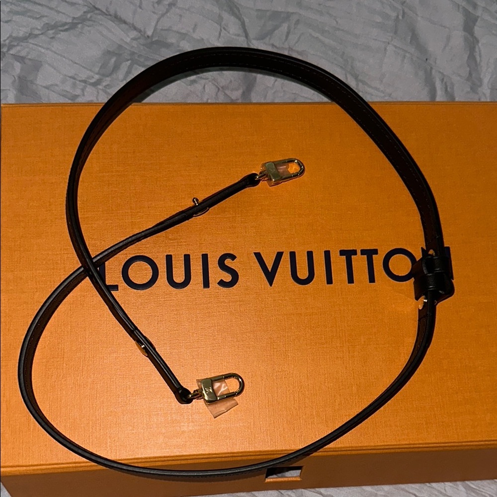Louis Vuitton Black Leather Strap with Gold Accents
Can ship next day